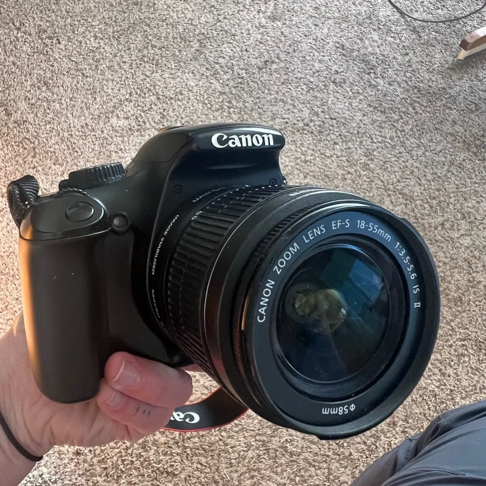 Cannon EOS 1100D camera with a 18-55 mm lens